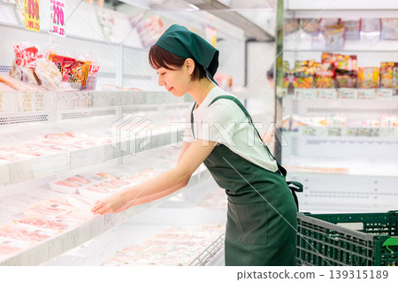 Supermarket employee, meat counter 139315189