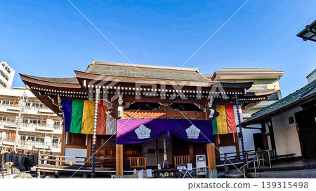 Tokaku-ji Temple Main Hall, home to Benzaiten, one of the Seven Lucky Gods of Kameido, Tokyo. Tokaku-ji Temple Main Hall, home to Benzaiten, one of the Seven Lucky Gods of Kameido, Tokyo. 139315498