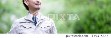 Portrait of a field worker for safety management and DX operations; close-up of the upper body looking at the camera, with no face visible (banner image) Portrait of a field worker for safety management and DX operations; close-up of the upper body looking at the camera, with no face visible (banner image) 139315653