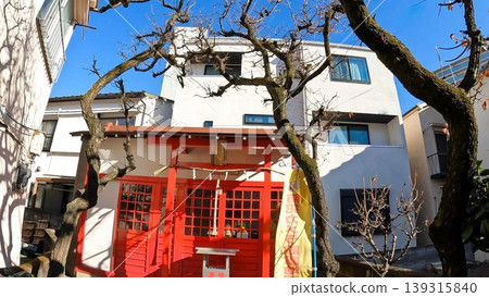A small Inari shrine nestled in a residential area of Tokyo. A small Inari shrine nestled in a residential area of Tokyo. 139315840