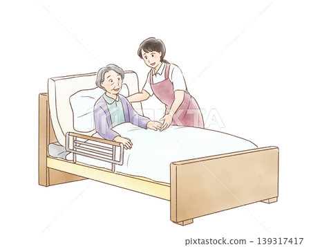 幫助老人在床上的女性護理人員 幫助老人在床上的女性護理人員 139317417