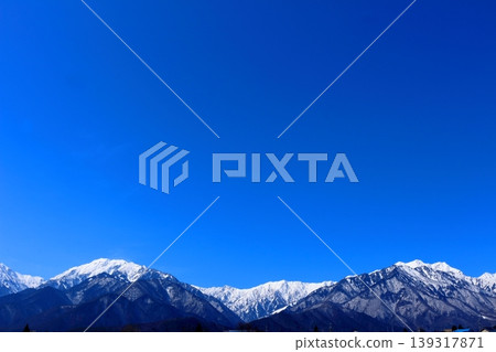 The Northern Alps from Shinano-Omachi in March; the snow-capped Northern Alps; the mountains of Shinshu. The Northern Alps from Shinano-Omachi in March; the snow-capped Northern Alps; the mountains of Shinshu. 139317871