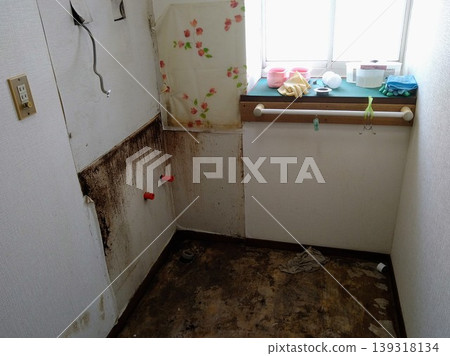 The old bathroom after the flooring was removed. The old bathroom after the flooring was removed. 139318134