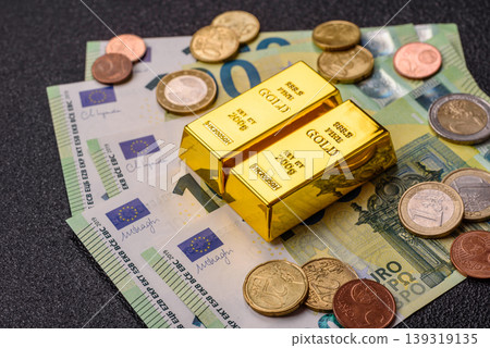 Gold bars or ingots as a tool for balance, financial investment, and savings. Gold bars Gold bars or ingots as a tool for balance, financial investment, and savings. Gold bars 139319135