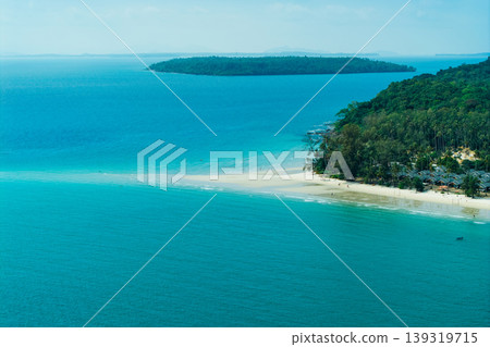 Drone shot of a serpentine winding road in a dense tropical forest. Drone shot of a serpentine winding road in a dense tropical forest. 139319715