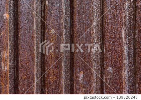 Rusty corrugated metal wall texture background with weathered industrial iron sheet for vintage architectural design 139320243