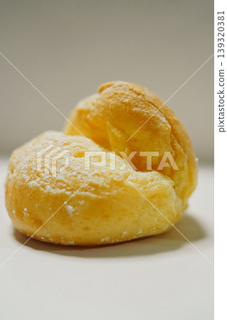These adorable bite-sized cream puffs, served on glassine paper, are perfect for teatime. These adorable bite-sized cream puffs, served on glassine paper, are perfect for teatime. 139320381