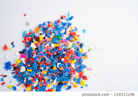 Plastic colorful pieces recycling shredded for industrial use. Plastic colorful pieces recycling shredded for industrial use. 139321296