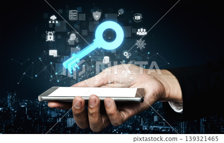 A hand holds a smartphone displaying digital key icons, highlighting themes of cybersecurity and data protection in a modern urban setting, emphasizing innovative technology solutions. Sigmoid A hand holds a smartphone displaying digital key icons, highlighting themes of cybersecurity and data protection in a modern urban setting, emphasizing innovative technology solutions. Sigmoid 139321465
