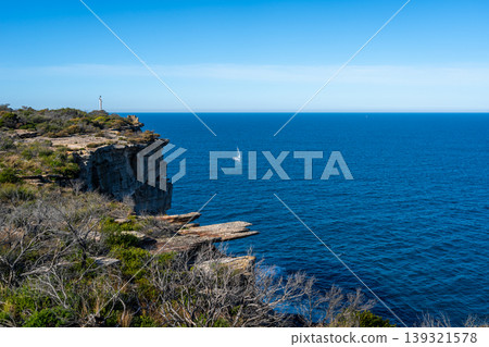 Dramatic coastal cliffs along Fairfax Walk in Manly, Sydney, Australia Dramatic coastal cliffs along Fairfax Walk in Manly, Sydney, Australia 139321578