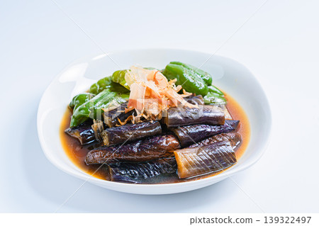 Grilled eggplant and bell peppers marinated in Japanese-style broth. A side dish of summer vegetables marinated in Japanese-style broth. (White background) Grilled eggplant and bell peppers marinated in Japanese-style broth. A side dish of summer vegetables marinated in Japanese-style broth. (White background) 139322497