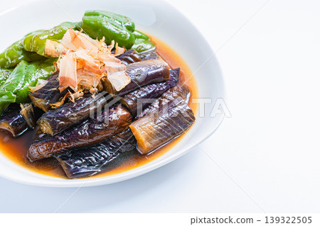 Grilled eggplant and bell peppers marinated in Japanese-style broth. A side dish of summer vegetables marinated in Japanese-style broth. (White background) Grilled eggplant and bell peppers marinated in Japanese-style broth. A side dish of summer vegetables marinated in Japanese-style broth. (White background) 139322505