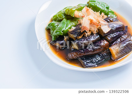 Grilled eggplant and bell peppers marinated in Japanese-style broth. A side dish of summer vegetables marinated in Japanese-style broth. (White background) Grilled eggplant and bell peppers marinated in Japanese-style broth. A side dish of summer vegetables marinated in Japanese-style broth. (White background) 139322506