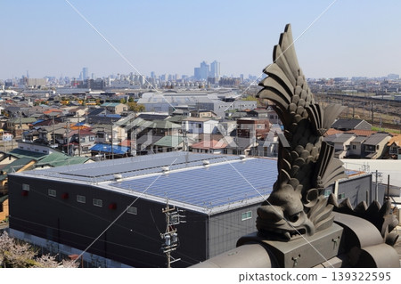 View towards Nagoya Station from the shachi (mythical fish-like creature) on the keep of Kiyosu Castle. View towards Nagoya Station from the shachi (mythical fish-like creature) on the keep of Kiyosu Castle. 139322595