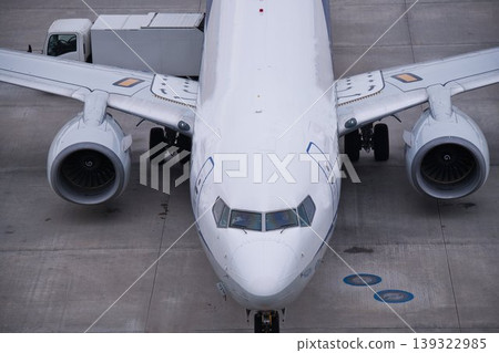 Airplane being parked Airplane being parked 139322985