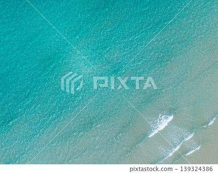 Aerial view of coral reefs and clear turquoise sea water in the Eastern Sea of Thailand. Aerial view of coral reefs and clear turquoise sea water in the Eastern Sea of Thailand. 139324386