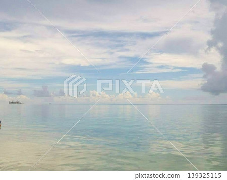 The calm, turquoise sea of Taketomi Island The calm, turquoise sea of Taketomi Island 139325115