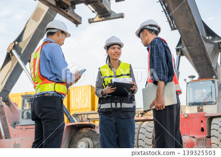 Asian Port Supervisor Giving Directions to Logistics Team at Thailand Container Terminal Yard 139325503