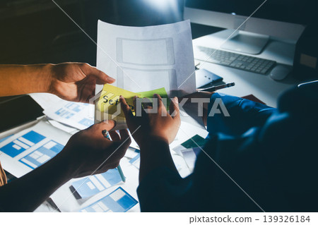 UXUI design brainstorming session with sketches and digital tools 139326184