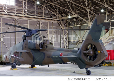 OH-1 observation helicopter inside the hangar OH-1 observation helicopter inside the hangar 139326598