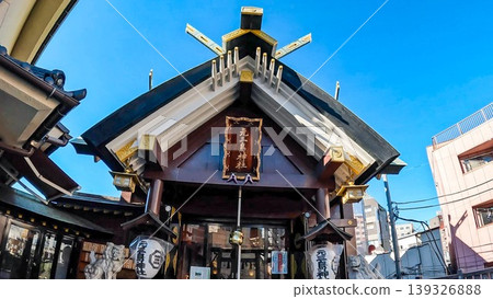 Tokyo, the Shinto shrine building of Moto-Mishima Shrine and the blue sky Tokyo, the Shinto shrine building of Moto-Mishima Shrine and the blue sky 139326888