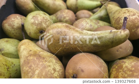 Fresh Conference Pears with textured skin in a wooden crate Fresh Conference Pears with textured skin in a wooden crate 139327608