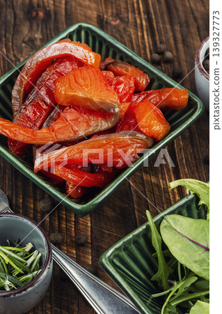 salted salmon pieces with herbs and spices 139327773