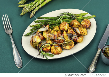 Spring roasted vegetables with asparagus and pesto Spring roasted vegetables with asparagus and pesto 139327783