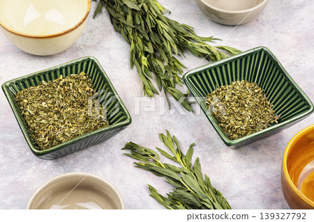 Aromatic tarragon herb fresh and dried for cooking Aromatic tarragon herb fresh and dried for cooking 139327792