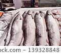 There are rows of fresh fish in the market. 139328848