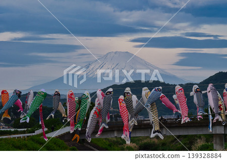 Carp streamers swimming towards Mount Fuji Carp streamers swimming towards Mount Fuji 139328884
