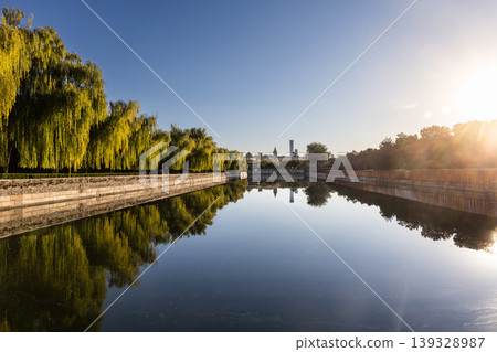 Scenic moat that surrounds Forbidden City in Beijing during sunrise. Scenic moat that surrounds Forbidden City in Beijing during sunrise. 139328987
