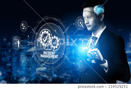 A businessman engages with advanced technology for incident management, showcasing data visualization in a modern urban setting, highlighting innovation and efficiency. Sigmoid A businessman engages with advanced technology for incident management, showcasing data visualization in a modern urban setting, highlighting innovation and efficiency. Sigmoid 139329251