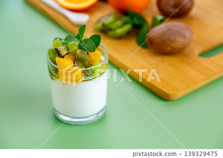 healthy yogurt parfait with kiwi and orange for breakfast healthy yogurt parfait with kiwi and orange for breakfast 139329475