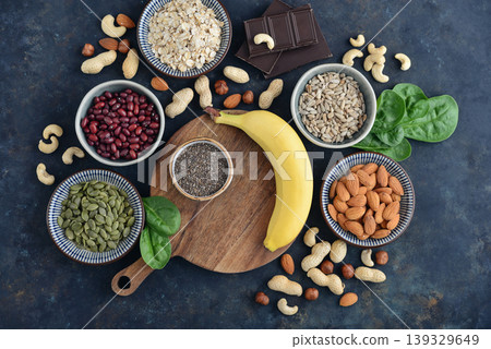 Top view of magnesium rich foods arranged on a dark background Top view of magnesium rich foods arranged on a dark background 139329649