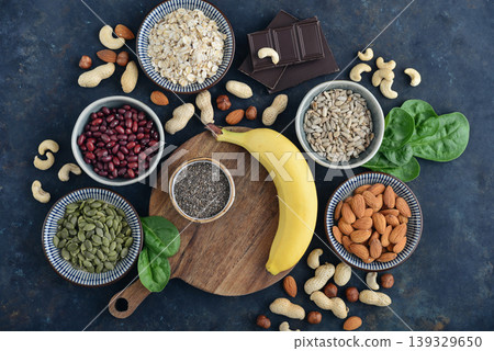 Top view of magnesium rich foods arranged on a dark background Top view of magnesium rich foods arranged on a dark background 139329650