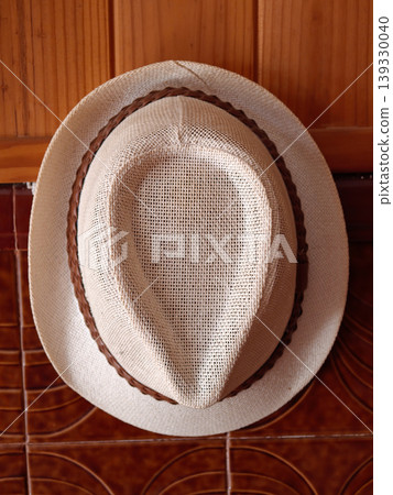 Light straw fedora hat with woven brown band 139330040