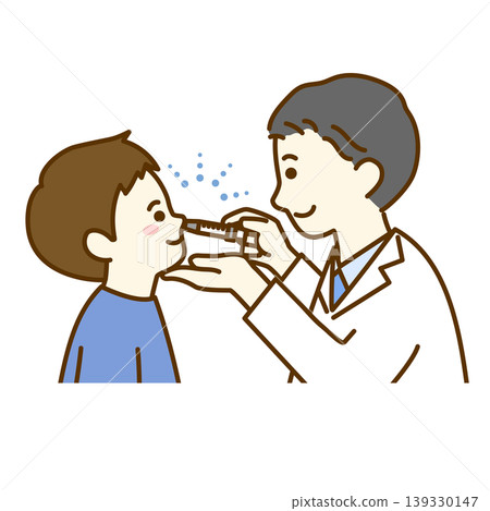 A boy receiving a nasal vaccine and a male doctor. A boy receiving a nasal vaccine and a male doctor. 139330147