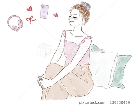 A woman in loungewear sitting on a cushion A woman in loungewear sitting on a cushion 139330439