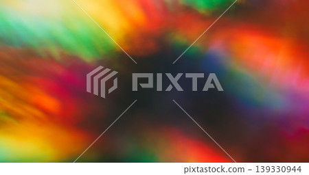 Bright blur leak. Colorful flare. Neon luminosity mixing reflection. Red green yellow optical lens spectrum on black abstract background. Bright blur leak. Colorful flare. Neon luminosity mixing reflection. Red green yellow optical lens spectrum on black abstract background. 139330944