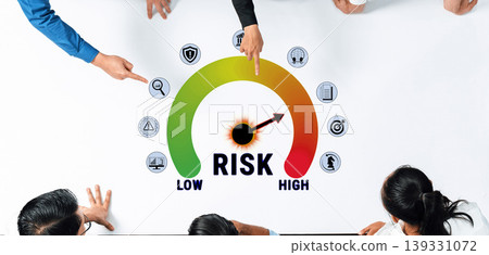 Team Discussion on Risk Assessment and Management with Indicator Scale Showing Low to High Risk Levels in a Professional Setting Fluxor Team Discussion on Risk Assessment and Management with Indicator Scale Showing Low to High Risk Levels in a Professional Setting Fluxor 139331072