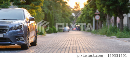 Close up of a car parked on city street side. Urban traffic concept 139331391