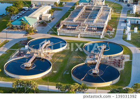 City water cleaning facility at wastewater treatment factory. Purification process of removing undesirable chemicals, suspended solids and gases from contaminated liquid City water cleaning facility at wastewater treatment factory. Purification process of removing undesirable chemicals, suspended solids and gases from contaminated liquid 139331392