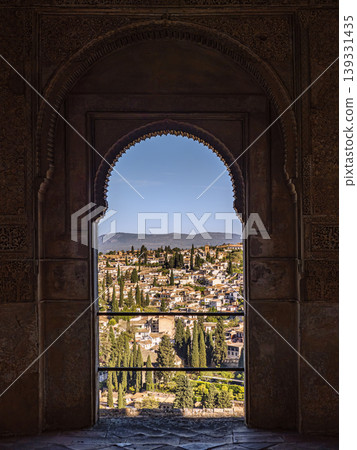 View Through Ornate Alhambra Arch Over Albaic?n Neighborhood in Granada, Spain - Historic Moorish Cityscape View Through Ornate Alhambra Arch Over Albaic?n Neighborhood in Granada, Spain - Historic Moorish Cityscape 139331435