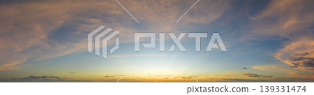 Beautiful sunset sky scenery. Bright colorful orange and yellow clouds on horizon Beautiful sunset sky scenery. Bright colorful orange and yellow clouds on horizon 139331474
