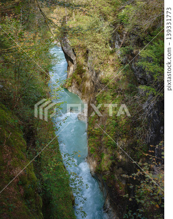 Europe summer travel to Slovenian Alps, Izvir Kamniske Bistrice walk or hike in forest near mountains river Europe summer travel to Slovenian Alps, Izvir Kamniske Bistrice walk or hike in forest near mountains river 139331773