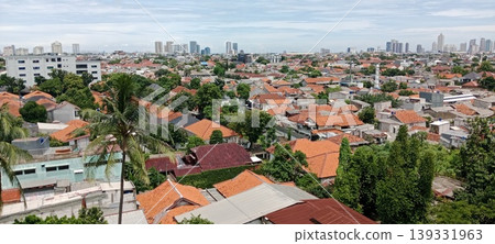 Panorama of residents with red roofs blending into skyscrapers Panorama of residents with red roofs blending into skyscrapers 139331963