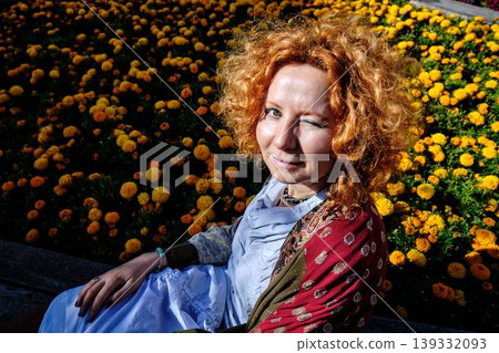 mature woman with paper umbrellas in cafe mature woman with paper umbrellas in cafe 139332093