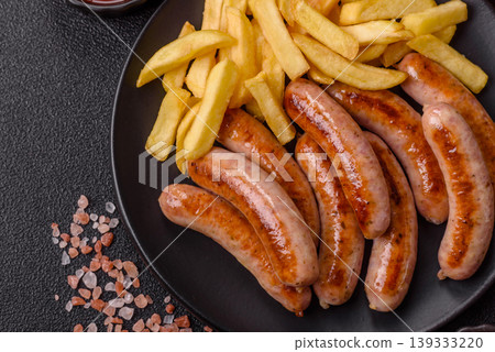 Grilled or barbecued chicken sausages for the dinner table. Grilled sausages 139333220