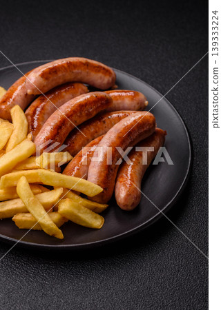 Grilled or barbecued chicken sausages for the dinner table. Grilled sausages 139333224
